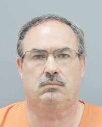 STANDING WITH COLTON