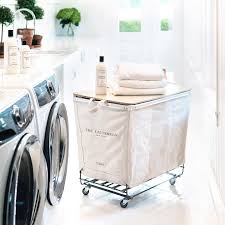 steele canvas triple hamper with folding table the laundress the laundress laundress stylish storage