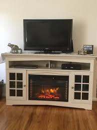 Home Decorators Collection Avondale Grove 59 In Tv Stand Infrared Electric Fireplace In Aged White 365 166 165 Y The Home Depot In 2020 Tv Console With Fireplace Fireplace Tv Stand Home Decorators Collection