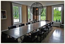This contemporary ensemble is accented with a. Extra Long Dining Table