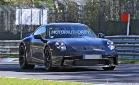 Although the 911 carrera's turbocharged engine sounds pretty good, the gt3 is on another level. 2022 Porsche 911 Gt3 Touring Spy Shots Track Star S Mild Mannered Sibling Spotted
