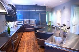 A backsplash is a bright and bold color, as is the wallpaper; Contemporary Kitchen Cabinetry St Louis Homes Lifestyles