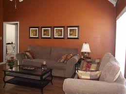 Here, a burnt orange accent chair and. My Orange And Yellow Living Room Needs Help Living Room Paint Color Ideas Orange Living Room Paint Paint Colors For Living Room