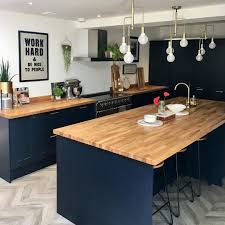 It can be used as a work surface, breakfast bar, desk tops, laboratories, table tops, retail and commercial. Navy Blue Kitchen Units Novocom Top