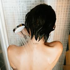 Part your wet hair how you want it, then place a pair of stockings or tights on top of your head with one leg on each side, almost like you're wearing a headband. Is Going To Sleep With Wet Hair Bad For Your Health In Some Way Self
