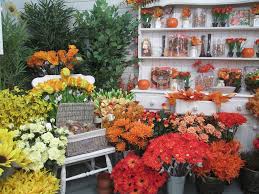 You can find fake flowers in the store called home goods. Silk Flower Shop Mud Island Garden Centre