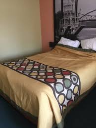 Wake up a boring bedroom with these vibrant paint colors and color schemes and get ready to start the day right. Bedroom Color Scheme Dark Teal Carpet Pea Green Wall Dark Peach Wall Mustard Yellow Bedspre Picture Of Super 8 By Wyndham Sturgeon Bay Tripadvisor