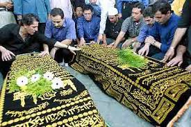 Iranian twins laleh and ladan bijani, joined at the head for 29 years, died within 90 minutes of each other tuesday after doctors separated them but were unable to control their bleeding in the. Outlook Photo Gallery Members Of Singapore S Iranian Community Touch The Coffins Of Ladan And Laleh Bijani After The Burial Preparation Ceremony Wednesday July 9 2003 In Singapore Fighting Back Tears And