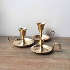 Vintage enamelled green candlestick holder. Sweet Set Of Three Vintage Brass Candlestick Holders With Handles This Is A Great Set Of Chambers Vintage Brass Candlesticks Candle Holders Brass Candlesticks