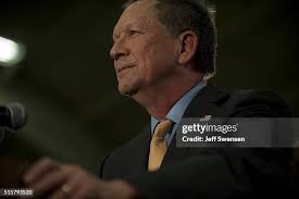 Adam Barone give the election official the thumps up after placing... News  Photo