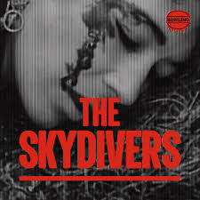 Skydivers Flutter Time And The Hunt For Mr. Ellis – Robin The Fog