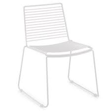 Modern dining chairs can be made of wood, metal, plastic, or upholstery and come in a large variety of colors ranging from neutral palettes to more bold colors to add an accent to the dining room. Velletri White Indoor Outdoor Solid Wire Dining Chair