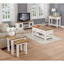 This coffee table is a perfect solution to storing small items, like remotes and books, while still keeping them easily accessible. The Willow Cream And Oak Collection Oak Furniture Living Room Coffee Table Beige Living Rooms