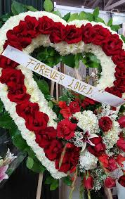 If you wish to customize your order please give us a call. Heart Shaped Funeral Flowers Are Often Given By The Immediate Family In Many Traditions Check With Funeral Flowers Funeral Flower Arrangements Casket Flowers