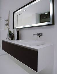 Is a metallic mirror more your style, or do you like the rustic look of a wooden frame? Shopping For A Bathroom Mirror Qb Blog Bathroom Mirror Design Modern Bathroom Modern Bathroom Mirrors