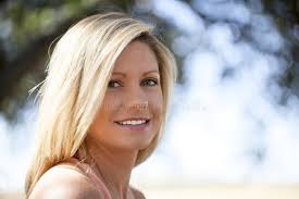 Blond Woman Wearing Sunglasses Buying Groceries in Market Stock Image