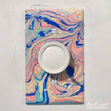 This is a video showing how to paint around light and power switches with a brush. Marbled Light Switch Covers With Easy Marble Diy