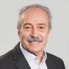 Our Team — Prism Economics and Analysis