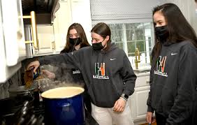 Hopkinton girls basketball team cooks meal for homeless shelter