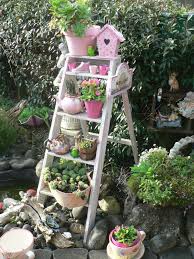 Old Ladder Garden Idea Put Grand Kids Potted Plants On The Ladder In The Secret Garden Painted Patio S Garden Ladder Vintage Garden Decor Shabby Chic Garden