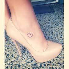 Heart tattoos on the chest area looks amazing. Small Heart Tattoo On Foot Hondjes Tatoeage