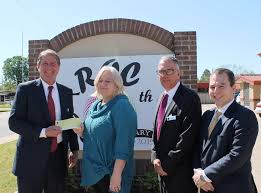 Herndon Fuqua Makes 50th Anniversary Donation To Roc Swark Today