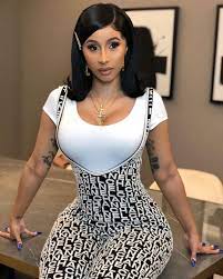 Celebs Love This Throwback 90s Hair Trend Cardi B Pics Hair Flip Cardi B Photos