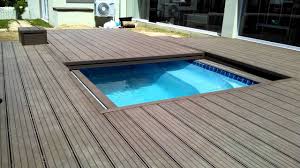 Decks4life Composite Deck With Motorized Pool Sliding Cover Wood Pool Deck Backyard Pool Backyard Pool Landscaping