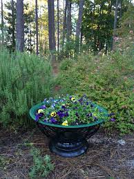 The forest ridge fire pit table will make anyone at your next outdoor gathering feel right at home. Rusty Old Fire Pit Painted And Transformed Into A Pansy Planter Backyard Fun Fire Pit Paint Container Gardening
