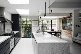Smiling woman in rubber gloves cleaning microwave with sponge. Kitchen Island Ideas Designs For Stylish Kitchen Islands House Garden