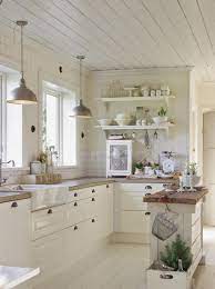The wall color of this farmhouse kitchen is essential gray and polished concrete—sherwin the custom designed hood features reclaimed bar wood. Home Art Farmhouse Kitchen Design Country Kitchen Kitchen Inspirations