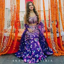 Showstopper Vibrant Mehendi Dresses Spotted On Real Brides In 2020 Mehendi Outfits Designer Lehenga Choli Lehenga Choli Online