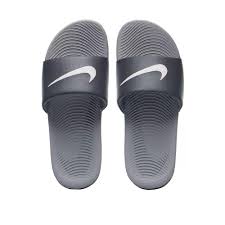 Whether you're heading to the beach or simply hanging around the house, these sandals provide a cushioned step via injected phylon midsoles and outsoles, and outsole flex grooves promote natural motion. Nike Men S Slides
