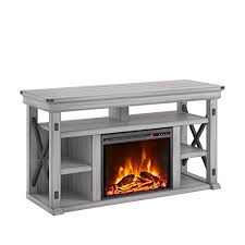 The tv stand can accommodate a flat screen tv up to 65 wide or 120 lbs. Ameriwood Home Wildwood Fireplace Tv Stand Rustic White Buy Online In Guadeloupe At Guadeloupe Desertcart Com Productid 69311790