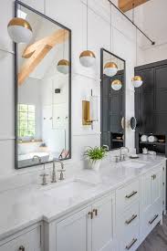 Blackened bronze fixtures helps this shower to feel integrated into the space. Black White Modern Farmhouse Bathroom Home Bunch Interior Design Ideas