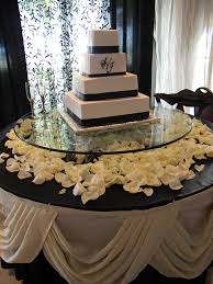 Love This Cake Stand Set Up The Glass Candles Flower Petals And Table Cloth Wedding Cake Table Cake Stand Set Cake Table Decorations