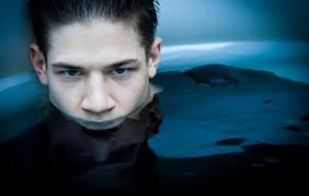 Woman Sticking Half of Her Face Out of Body of Water · Free Stock Photo