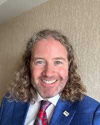 How it started vs. How it's going! It's only been one week, and I've  already surpassed my Lyons Mane Charitable Challenge donation goal, and my  beard is filling in nicely. But now,