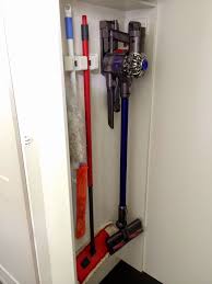 Dyson Charging Cupboard Google Search Dyson Cordless Vacuum Vacuum Storage Vacuum Cleaner Storage