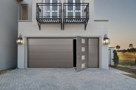10 Idees De Portes De Garages Moderne Porte De Garage Moderne Maori Credit Photo France Fermetures Portes De Garage Moderne Garage Moderne Porte Garage