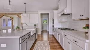 Shaker cabinets are often paired in modern kitchens with white or light granite countertops, stainless steel appliances and modern hardware to complete the look. White Cabinets With Black Hardware Pictures