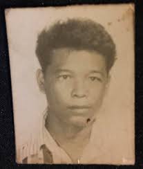 Can someone please restore this picture of my late father. This is the only  one that I have of him.