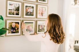 When considering how to hang a picture, the first step is to determine where you want your wall art to live. 4 Stylish Ways To Hang Family Photos Kelly Mcphail Photography