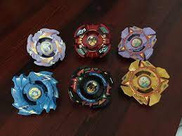 12pcs beyblade gold burst set spinning with grip launcher+portable box case toys. Beyblade Collection