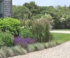 Stack and stagger tires to create decorative planters. Landscaping Ideas For Water Conservation Home Tips For Women