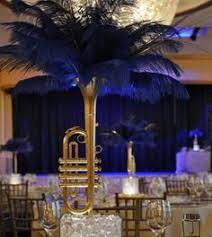 Take your party back to when jazz & big bands were king with a great gatsby themed event. Ideas For Prom Decorations By Theme Music Centerpieces Prom Decor Music Themed Parties