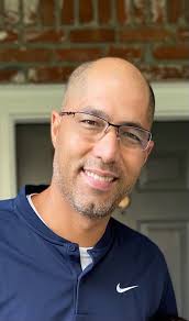 Rebels hire Chuck Cooper to be new volleyball coach