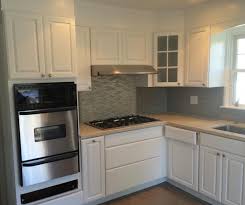 The super light grey which almost looks white complements this black and white kitchen beautifully. What S The Best Way To Clean Your White Kitchen Cabinets A G Williams