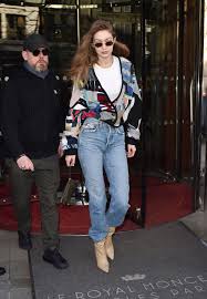 Her black pair of biker shorts styled with a simple white tee and a denim jacket thrown over. Gigi Hadid Street Style 01 18 2020 Celebmafia