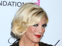 Tori Spelling enceinte prouve son amour à son mari... avec un tatouage !